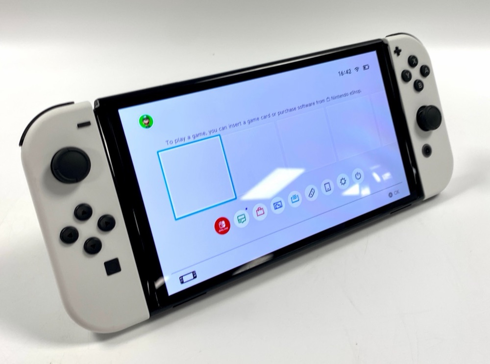Your white Switch OLED, from the eBay listing